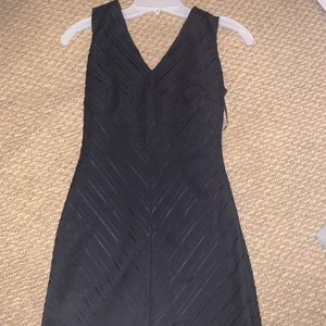 I am selling a classy black GUESS Los Angeles dress!